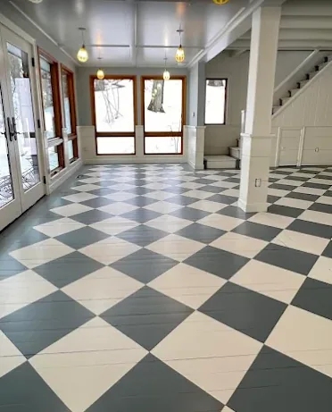 Hardwood floor finished in a custom painted checkerboard pattern